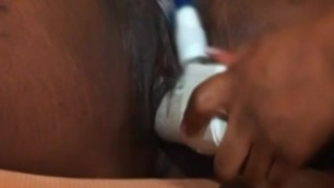 Two ebony play and squirt with strap-on