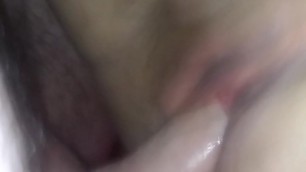 Between her legs and cum together