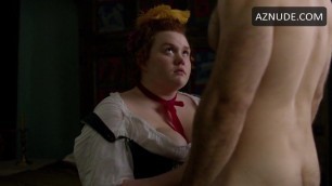 Whore giving a fit guy a handjob
