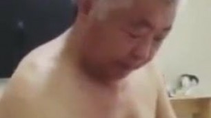 Lovely Chinese grandpa playing and sucking cock
