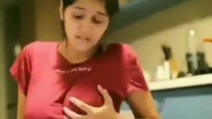 Aroused desi girl touching and squeezing boobs