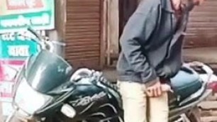 Indian man pumping upr penis in open street