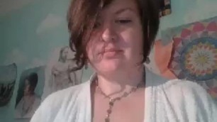 Milf playing with her chubby belly