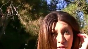 Teen masturbates outdoors in close-up scene