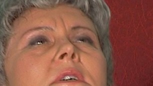 Granny rolls her eyes because a big cock is stuck in her ass