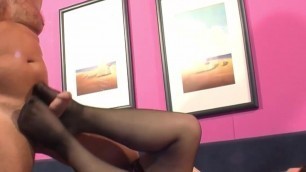 Chubby cutie in stockings gives footjob