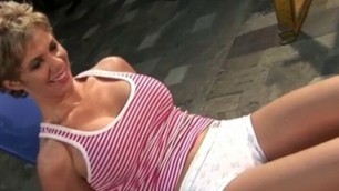 Busty MILF works out in naked scene