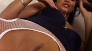 Latin beauty licks on a massive thick cock and then fucks