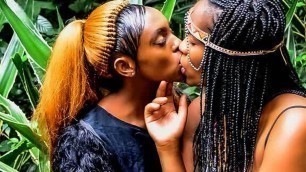 African festival outdoor lesbian make-out