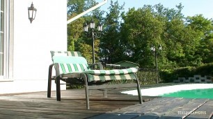 Watching this lush blonde enjoy sensual anal sex by the pool