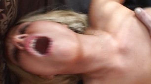 Superb German babe getting fucked by two cocks in the living room