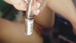 Hot whore pushing herself on a thick sex machine and cumming