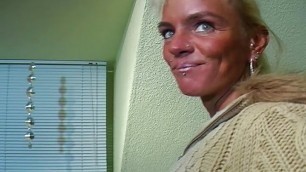 Slim and old German blonde loves stuffing her dildo deep inside