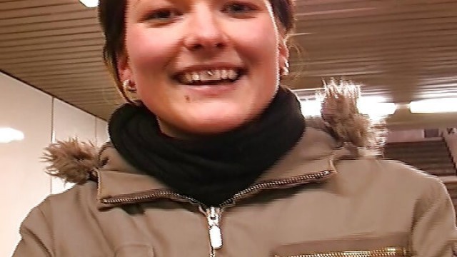 Short haired German shut pleasing her pierced pussy in the bedroom