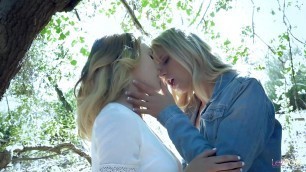 Lesbo blondes strip each other off in the woods before